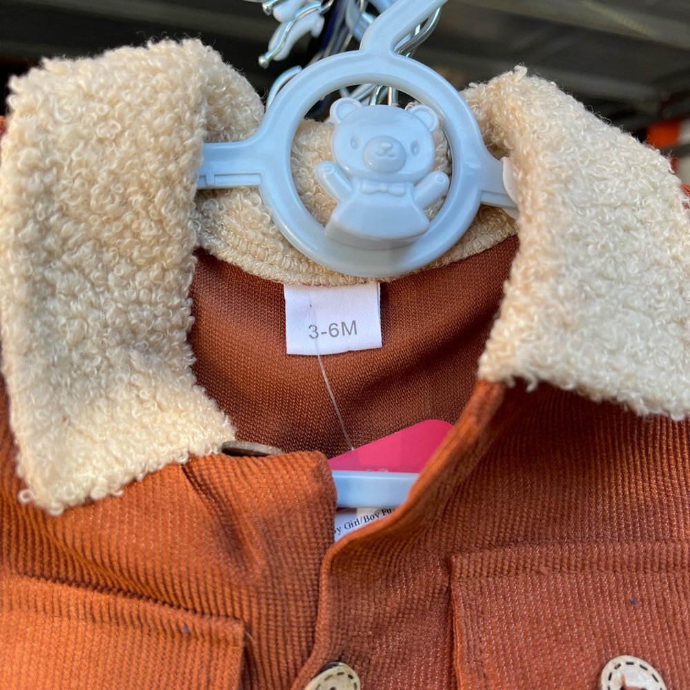 Styling baby boys is getting easier. Look at this adorable one piece.
